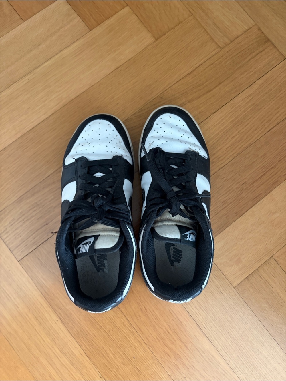 Nike women’s Black and White Low-Top Sneakers